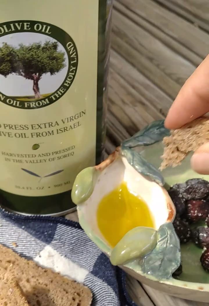 HOLIVE bottle ready for bread dipping, showcasing versatile use