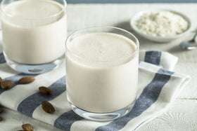 Hollander Sweet Creme Frappe Base glass shows creamy, dairy-forward frappé texture.