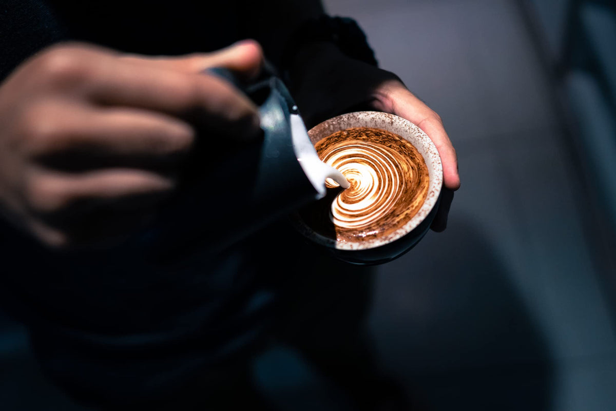 Hollander Sweet Ground Dutched Chocolate Powder pour-over setup demonstrates versatile beverage potential