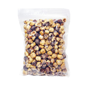 Holmquist Hazelnuts skins mostly removed close-up, quick clean snacking.