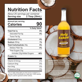 Holy Kakow Coconut Syrup in a coffee cup releasing tropical aroma.
