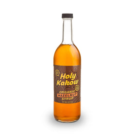 Holy Kakow hazelnut syrup bottle front showcases rich aroma ideal for coffee lovers.