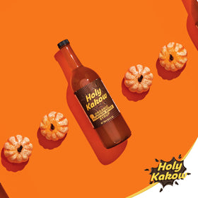 Holy Kakow orange syrup ingredients-closeup highlights real-food components and Colombian sugar