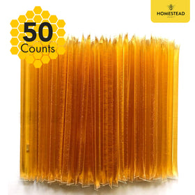 Homestead Honey sticks on a charcuterie board add a delicate honey note.
