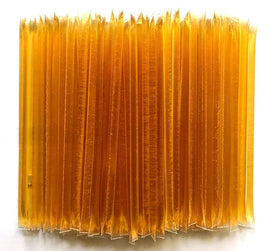 Bulk 50-pack packaging of Homestead Honey sticks keeps a ready supply.
