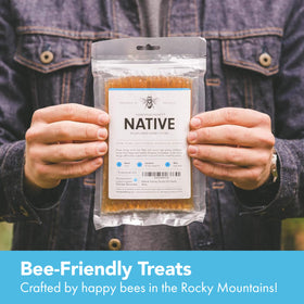 Yogurt topped with Homestead Honey sticks for gentle flavor balance.
