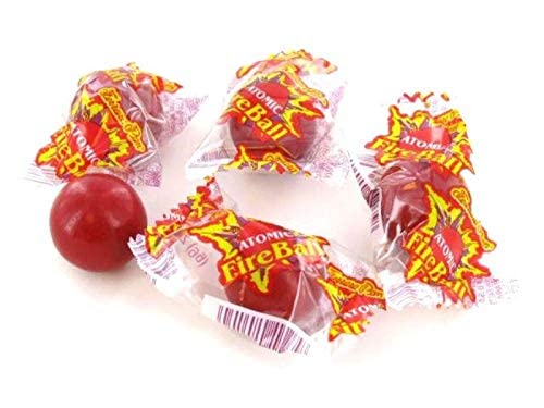 Homos Atomic FireBall candy close-up texture reveals crunchy shell and heat