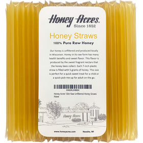 Honey Acres Raw Clover honey straw packaging with a bright label for a quick, mess-free snack.