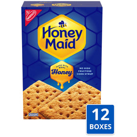 Hand holding Honey Maid graham crackers for a quick, satisfying snack.