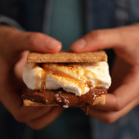 Honey Maid graham crackers s'mores setup with marshmallows and chocolate.