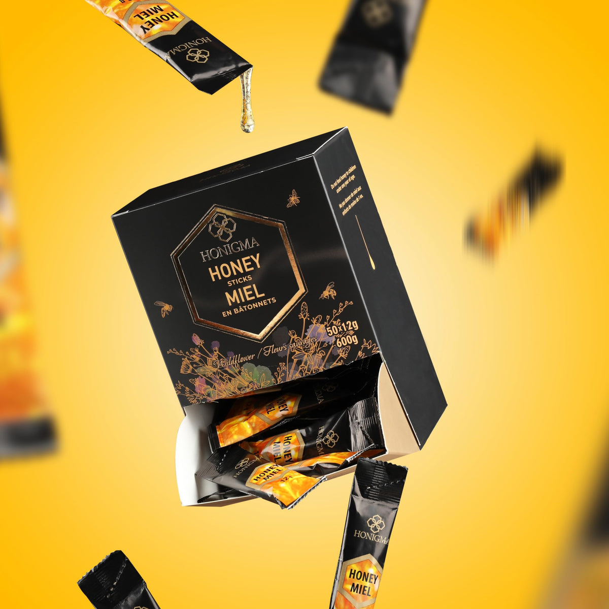 HONIGMA Acacia honey stick 50-count pack visual shows value and sharing potential.