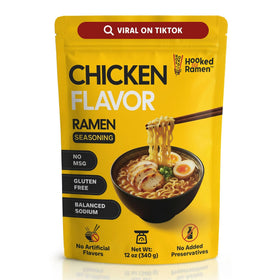 Hooked on Ramen gluten free chicken ramen seasoning being poured to enrich broth