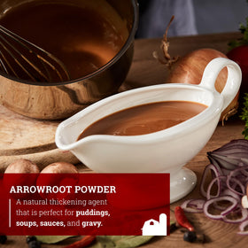 Measuring Hoosier Hill Farm Arrowroot Powder with a scoop for precision