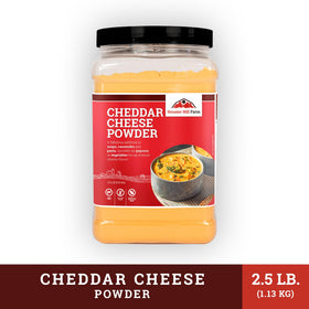 Hoosier Hill Farm cheddar cheese powder sprinkled on popcorn for bold flavor