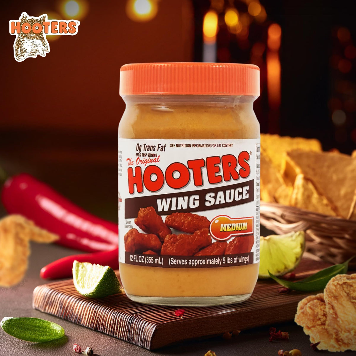 THE ORIGINAL HOOTERS Hooters Original Medium Wing Sauce bottle close-up shows rich texture for dipping.
