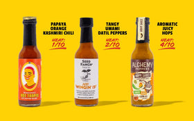 Hot Ones Pickled Garlic Sriracha bottle with tangy garlic-forward heat