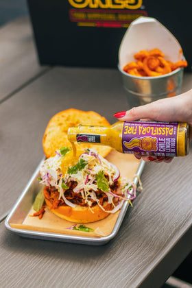Hot Ones Hawaiian HotTs POG bottle pour delivers island fruit kick for burgers