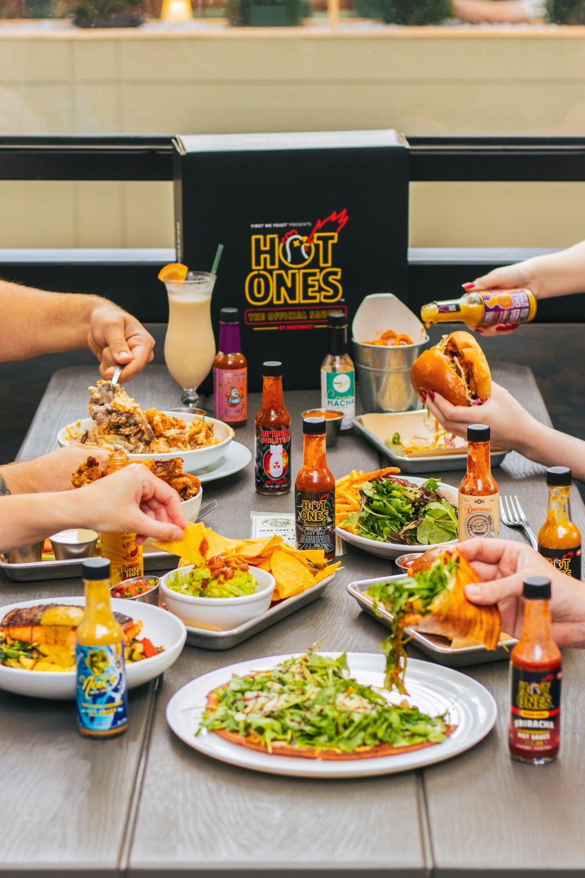 Hot Ones Neils Real Deal Chimichurri Habanero bottle pour pairs with grilled steaks