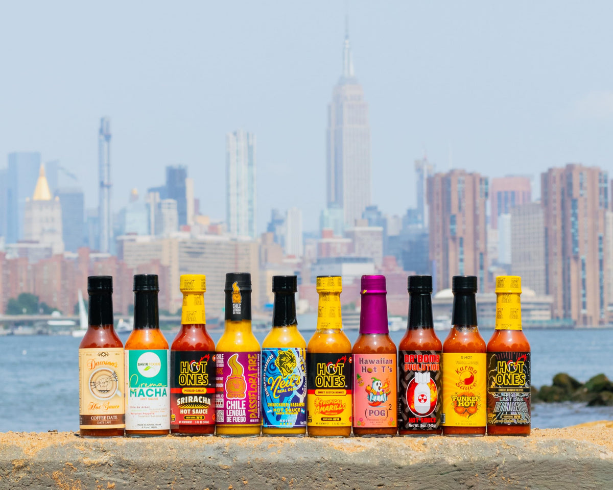 Hot Ones Tropical Amarillo bottle pour brings sunny citrus heat to bowls and tacos
