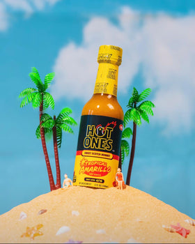 Pineapple and mango ingredients shown with subtle mustard and curry notes for balance.