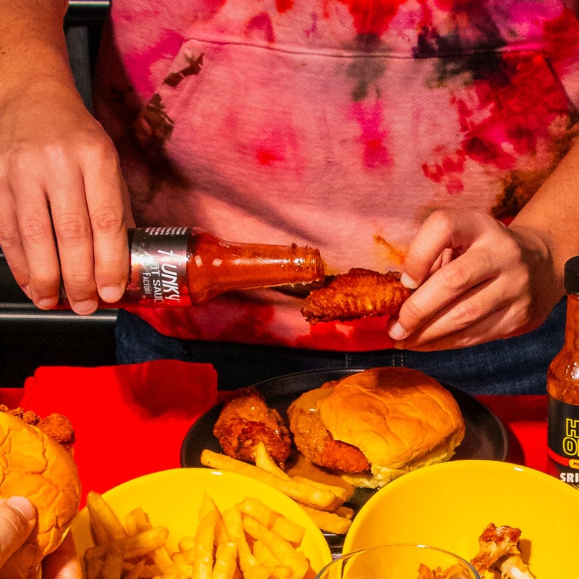 Hot Ones variety flavors bottles stand conveys diverse heat profiles for experimentation