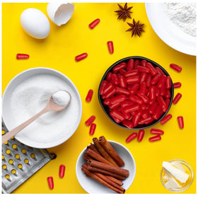 Hot Tamales serving plate scene highlights fiery, sweet cinnamon bites.