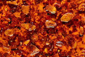 Hot Crispy Oil chili peppers heat image hints at balanced spice for drizzle-worthy dishes