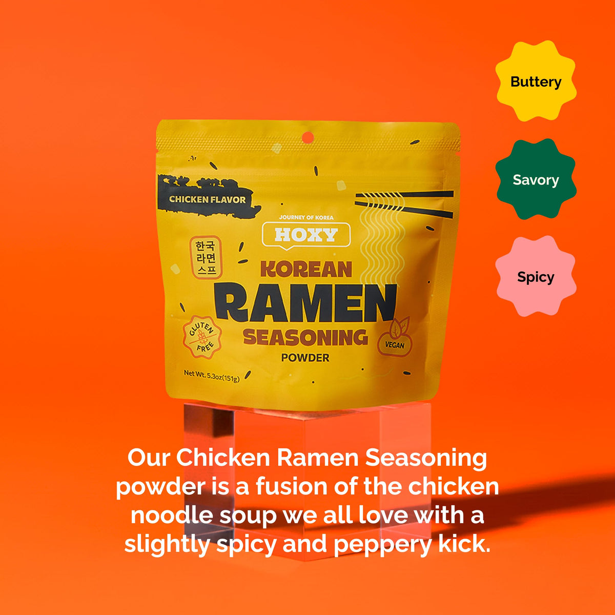 HOXY Chicken Ramen Seasoning powder in hot broth, comforting aroma.
