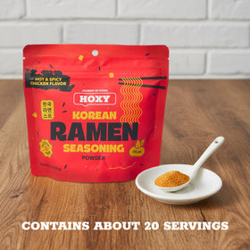 HOXY ramen seasoning powder closeup shows textured granules and color