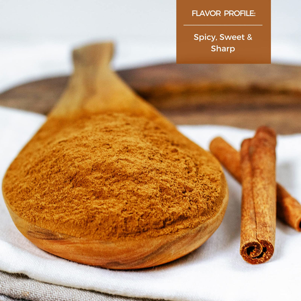 HQOExpress cinnamon powder being poured over oats for breakfast flavor.