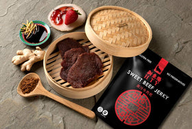 HTY Sweet Beef Jerky close-up texture highlights glossy meat and spices.