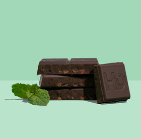 Hu Chocolate Bars Organic cacao and fair-trade nibs emphasize sustainable sourcing.