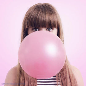 Hubba Bubba Max hand forming a bubble for playful chewing
