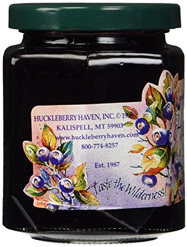 Huckleberry Haven jam being poured to glaze pastries with a fruity finish.