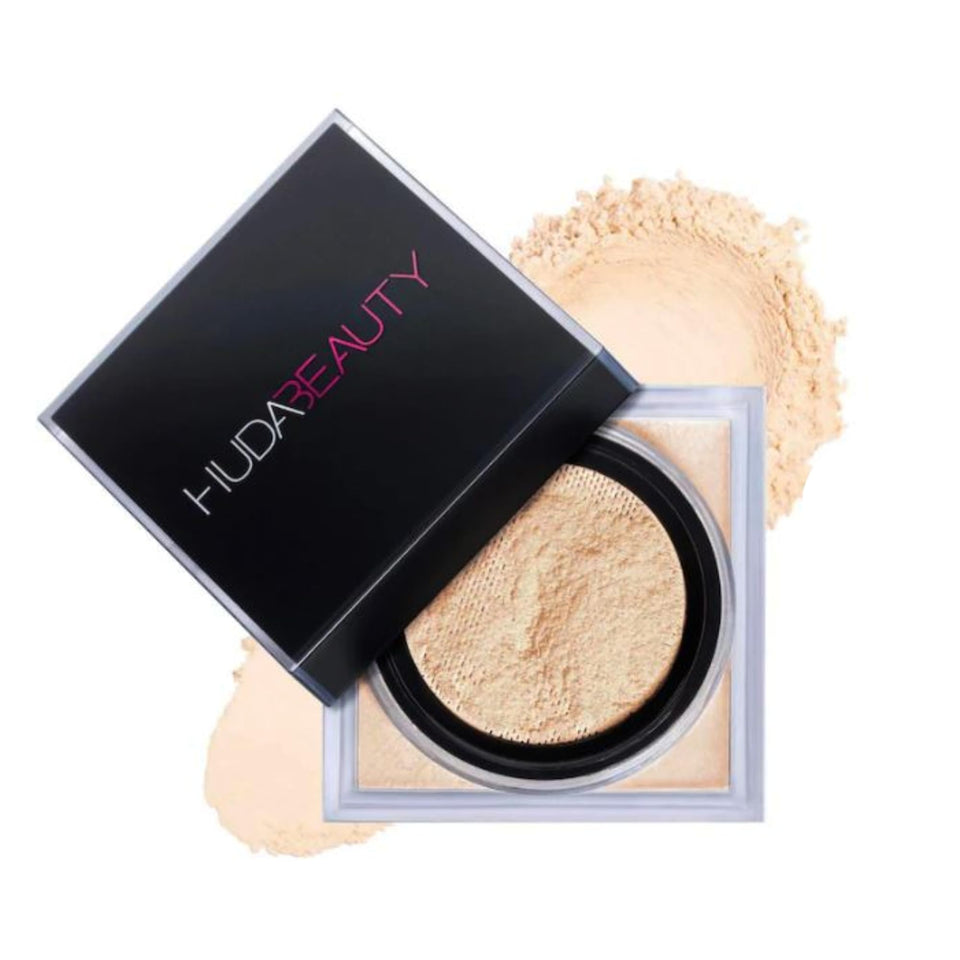 Huda Easy Bake Pound Cake powder jar creates a translucent matte veil for shine control.
