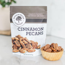 Hudson Pecan Cinnamon Candied Pecans 8oz pouch for on-the-go snacking and flavorful salads.