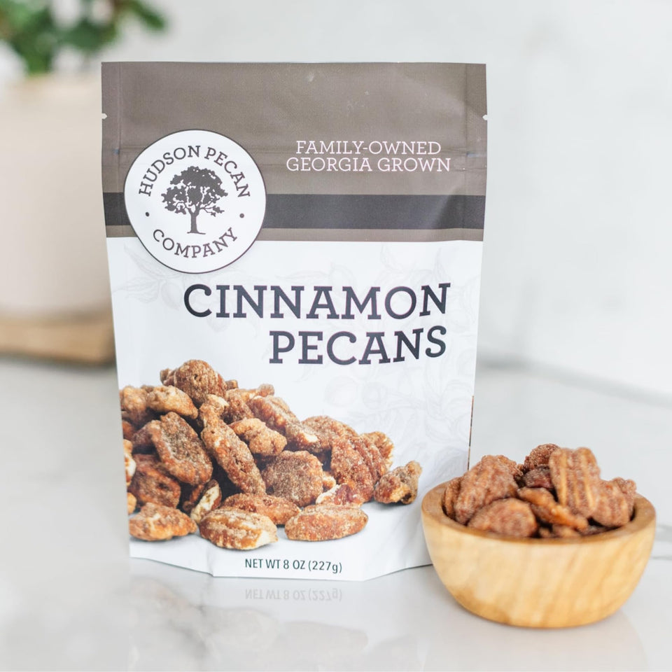 Hudson Pecan Cinnamon Candied Pecans 8oz pouch for on-the-go snacking and flavorful salads.