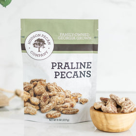 Hudson Pecan Company praline roasted pecans in a resealable 8 oz pouch for fresh snacking