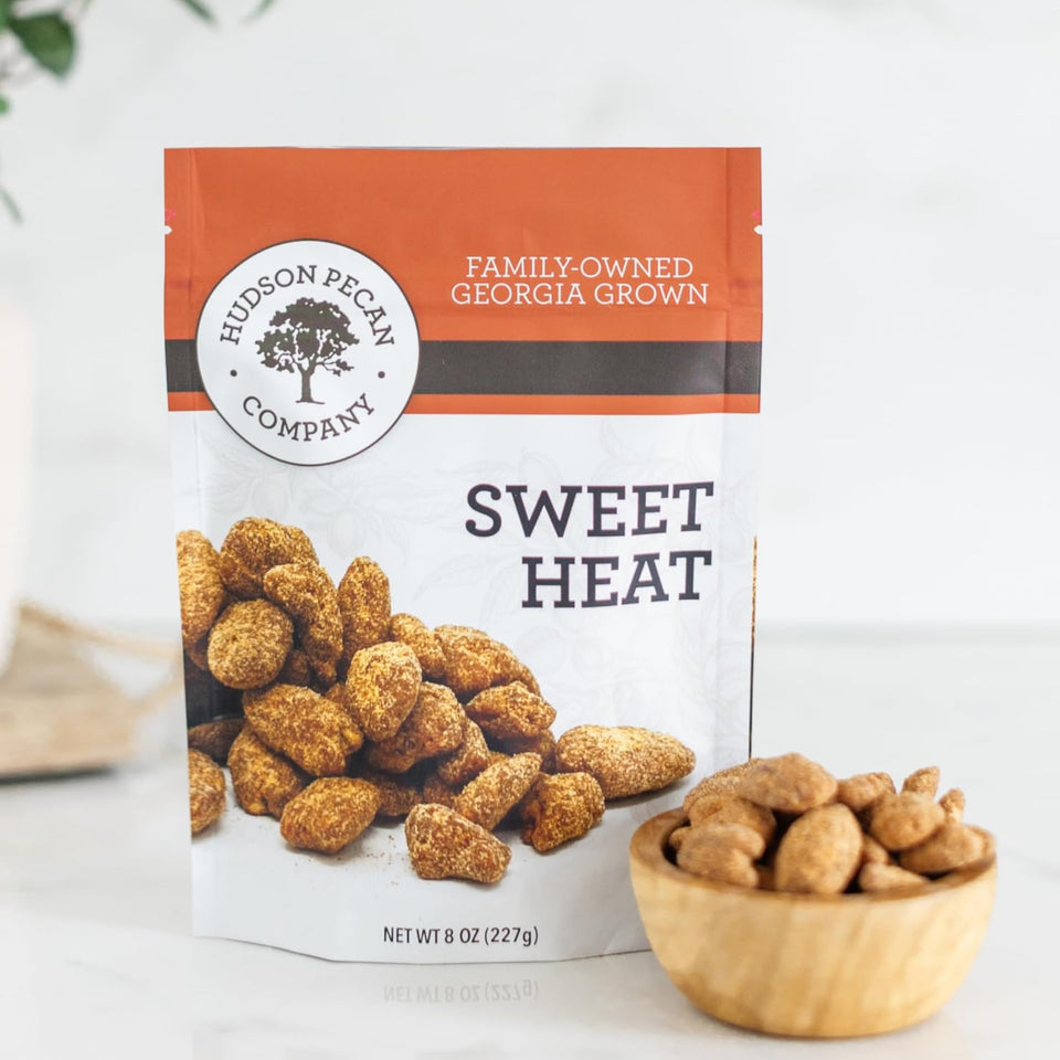 Hudson Pecan Company Sweet Heat bag closeup, a tasty, convenient snack for busy days.