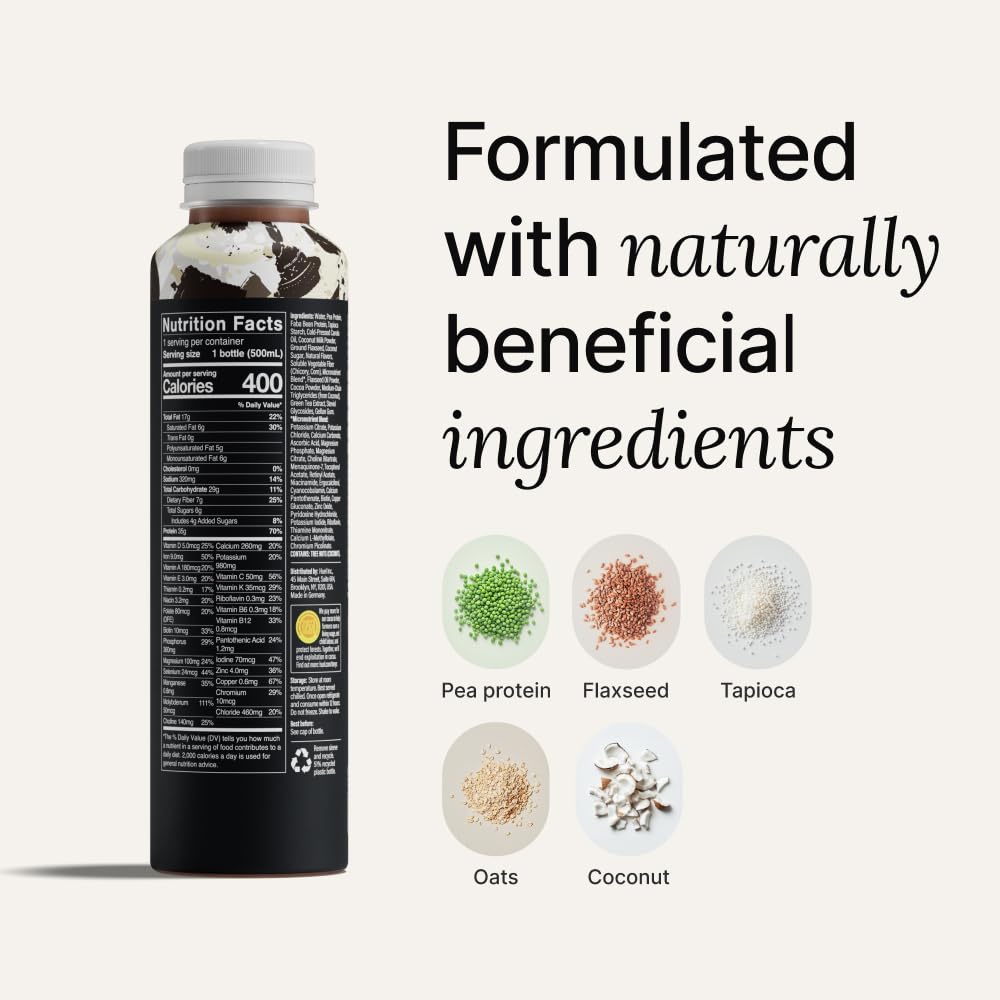 Cookies and Cream shake in a glass from Huel Black Edition