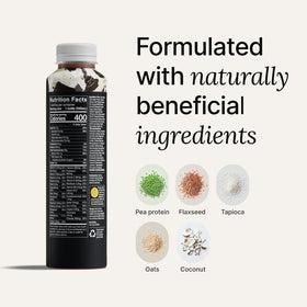 Cookies and Cream shake in a glass from Huel Black Edition