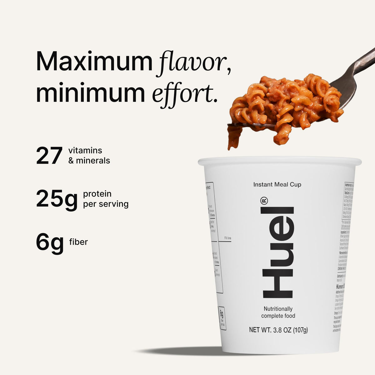 Hot water being poured into Huel Cajun Pasta cup for quick prep.