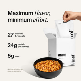 Huel hot and savory bolognese bowl steaming, ready in minutes for a satisfying dinner.
