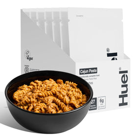 Huel Hot and Savory Cajun Pasta pack front showing quick, protein-rich meal for busy days.