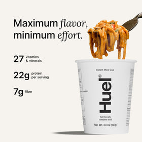 Huel cup unboxing showing packaging and nutrition information for eight servings.