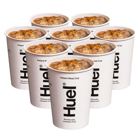 Preparing Huel Korean BBQ cup with hot water for a comforting meal