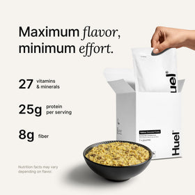 Huel Hot Savory Yellow Coconut Curry bowl steaming for a warm, high-protein lunch.