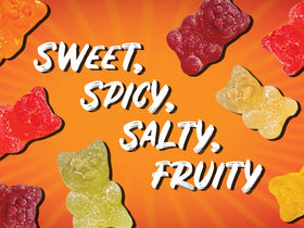 Table arrangement of Huer Frank's RedHot gummy bears for bold gatherings.