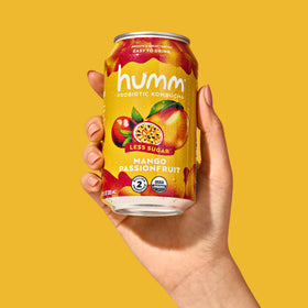 Humm Mango Passionfruit close-up bubbles convey a fizzy, probiotic-refreshing experience