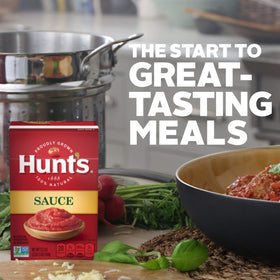 Hunt's Tomato Sauce label close-up shows natural ingredients and no artificial preservatives.